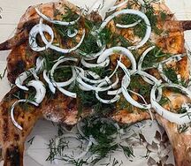 Целая курица на углях