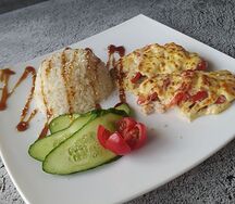 Горбуша запеченная под сыром с гарниром