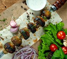 Грибы шампиньоны на мангале