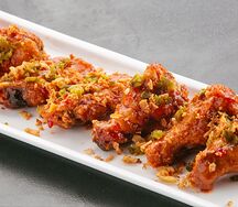 Острые крылышки с перцем халапеньо