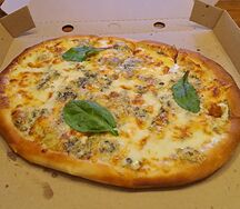 Пицца четыре сыра