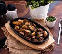 Свинина с молодым картофелем и грибами