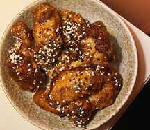 Куриные крылья в соусе апельсиновый чили