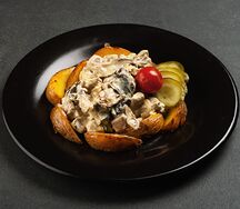 Свинина в сливочном соусе с грибами