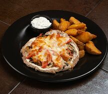 Свиная отбивная с гарниром