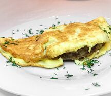 Бифштекс в омлете