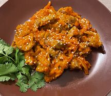 Желудочки тушёные с томатом