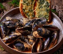 Мидии в соусе том ям