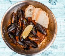 Мидии в томатном соусе