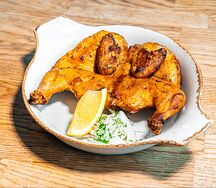 Половина запеченного цыпленка