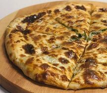 Осетинский пирог с зеленью и сыром