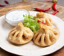 Хинкали жареные с соусом тузлук