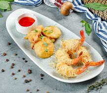 Креветки и сезонные овощи в хрустящем тесте катаифи