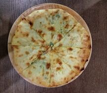 Осетинский пирог с сыром и зеленью