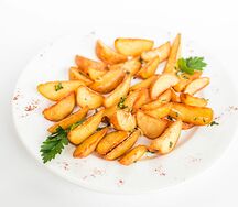 Картофельные дольки с чесноком