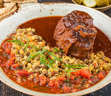 Томленое телячье колено с чечевицей