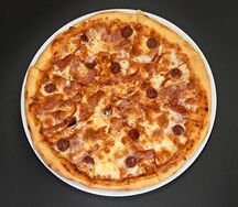 Мясная пицца Ассорти