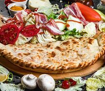 Пицца кальцоне