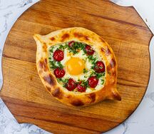 Хачапури по-аджарски с помидорами черри