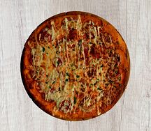 Пицца с ветчиной и сыром