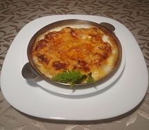 Пельмени, запечённые в сметане с сыром