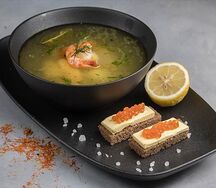 Уха из осетрины с красной икрой