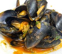 Мидии в томатном соусе