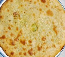 Осетинский пирог с сыром, картофелем и зеленью