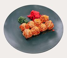 Запеченные роллы с крабом и соусом спайси-краб