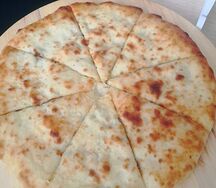 Пирог осетинский с бараниной и сыром большой