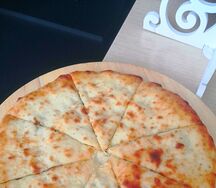 Пирог осетинский с сыром, ветчиной и грибами