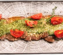 Язык под соусом песто с пармезаном