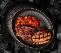 Корейка на кости с фасолью