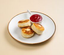 Сырники с малиновым соусом 