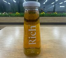 Rich в стекле яблоко