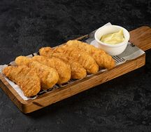 Куриные наггетсы с соусом карри