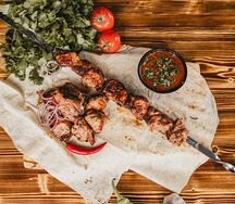 Шашлык из шеек поросенка в брусничном маринаде