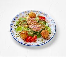 Нисуаз с перепелиным яйцом и картофельными крокетами
