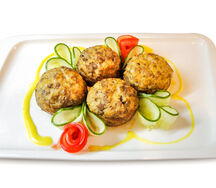 Шампиньоны, фаршированные фаршем и овощами