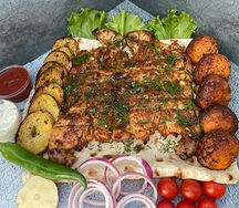 Курица целиком на мангале