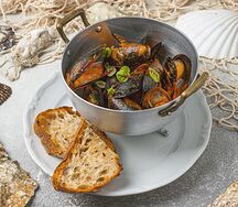 Мидии в томатном соусе