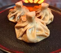 Жареные хинкали с сыром и тархуном