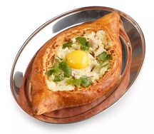 Хачапури по-аджарски чкмерули