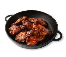 Куриные крылья в соусе барбекю