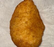 Жареный пирожок с картошкой и луком