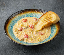 Рапаны по фирменному рецепту в сливочном соусе