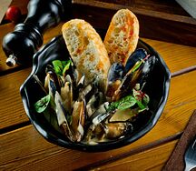 Мидии в соусе дорблю