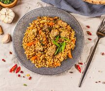 Плов ароматный с мясом свиным