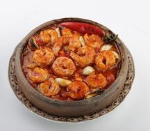 Тажин с креветками в томатном соусе