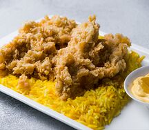 Креспи на тарелке с рисом